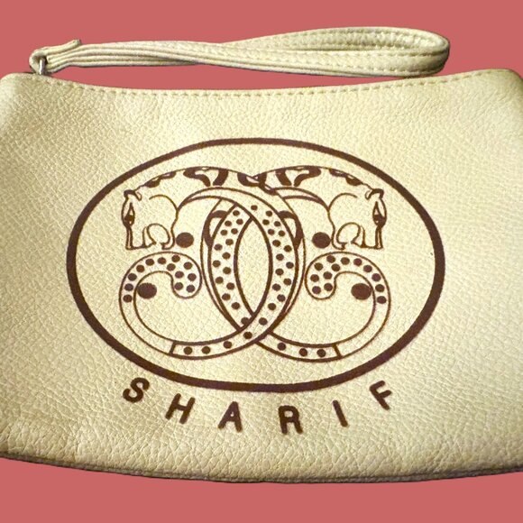 Sharif Ivory Wristlet with Animal Print Interior Silver Hardware - Picture 1 of 8